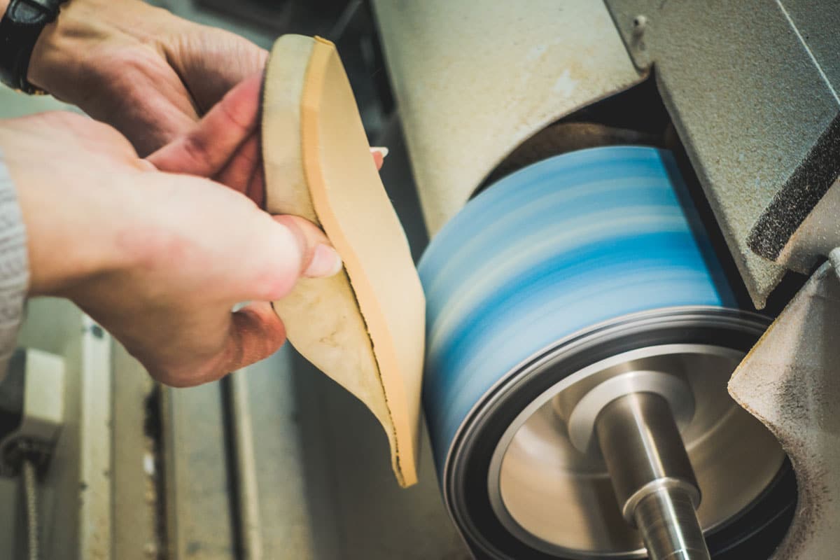 Thera-Ped technician handcrafting custom orthotics.
