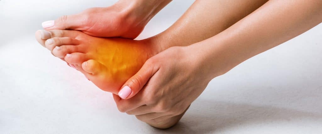 Woman with severe foot pain. My shoes are hurting me.